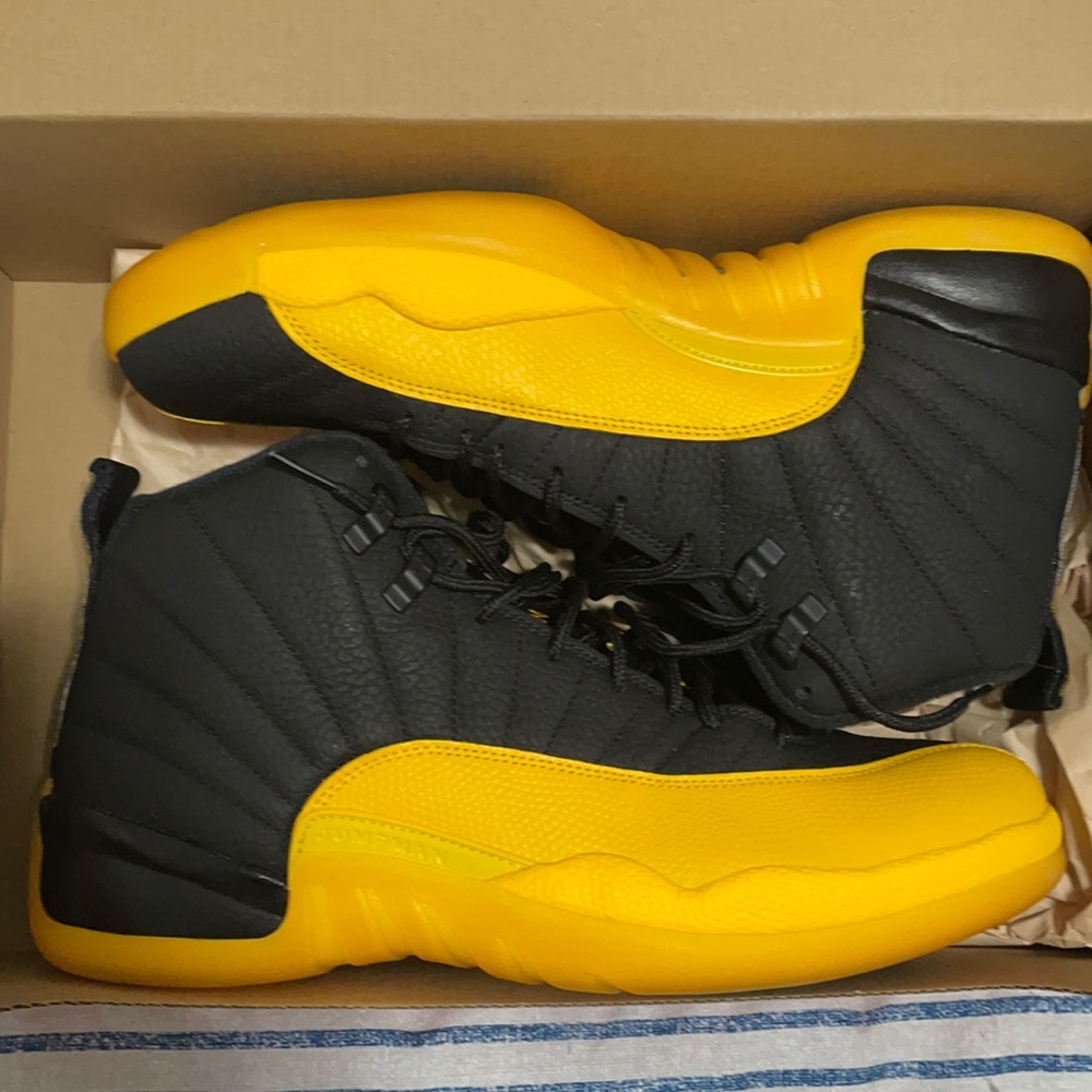 Black and yellow jordan 12